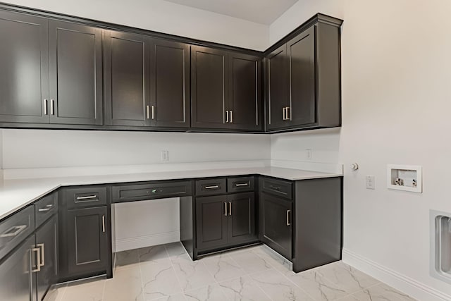 14448 Walsh, Aledo, TX 76008 - laundry area featuring cabinet space, light marble finish flooring, washer hookup, and baseboards