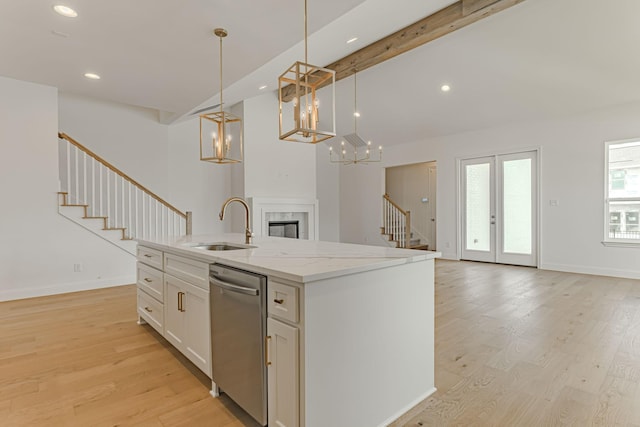 14448 Walsh, Aledo, TX 76008 - kitchen with dishwasher, a sink, light wood-type flooring, open floor plan, and an island with sink