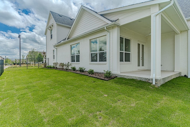 14448 Walsh, Aledo, TX 76008 - view of side of home with a patio area and brick siding