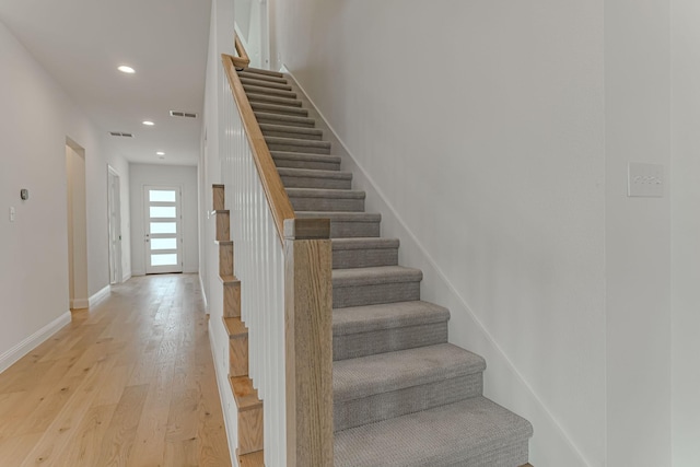 14448 Walsh, Aledo, TX 76008 - stairs featuring wood finished floors, recessed lighting, and baseboards