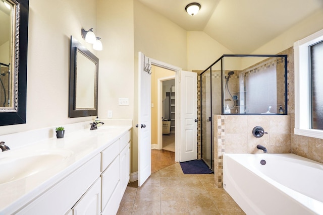 5204 Agave Way, Fort Worth, TX 76126 - bathroom with a stall shower, a garden tub, double vanity, vaulted ceiling, and tile patterned flooring
