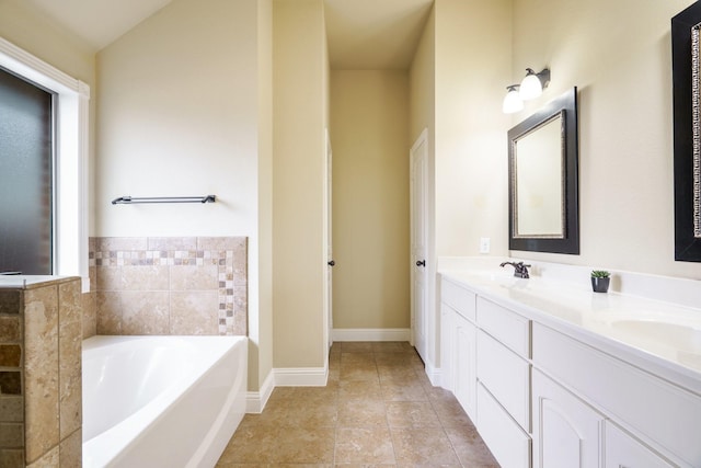5204 Agave Way, Fort Worth, TX 76126 - bathroom featuring a garden tub, double vanity, and tile patterned floors