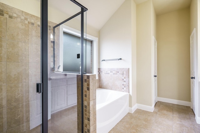 5204 Agave Way, Fort Worth, TX 76126 - full bathroom featuring a bath, a shower stall, tile patterned flooring, and baseboards
