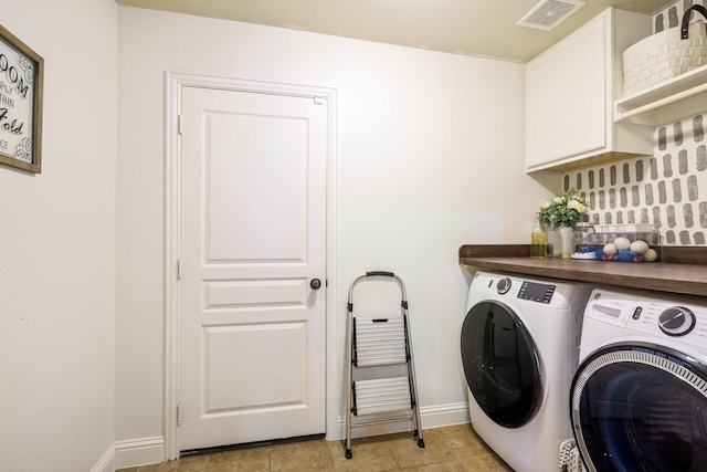 5204 Agave Way, Fort Worth, TX 76126 - laundry area with washing machine and clothes dryer, cabinet space, and baseboards
