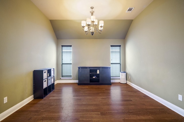 5204 Agave Way, Fort Worth, TX 76126 - unfurnished living room with lofted ceiling, a chandelier, healthy amount of natural light, dark wood-type flooring, and baseboards