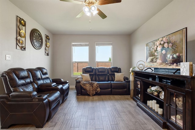11413 Leeson St, Fort Worth, TX 76052 - living room featuring a ceiling fan, light wood-type flooring, and baseboards