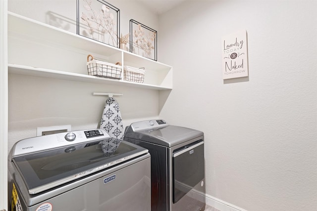 11413 Leeson St, Fort Worth, TX 76052 - washroom featuring washing machine and clothes dryer and baseboards