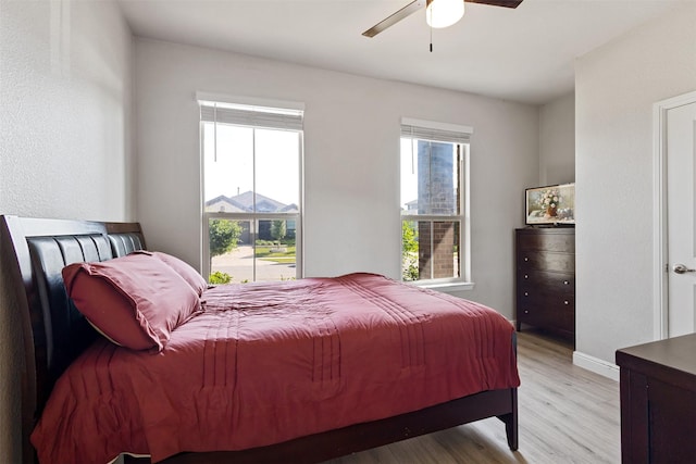 11413 Leeson St, Fort Worth, TX 76052 - bedroom featuring light wood finished floors, baseboards, and ceiling fan