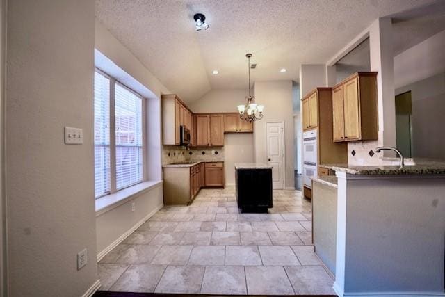 833 Tablerock Way, Lewisville, TX 75077 - kitchen featuring stainless steel microwave, a chandelier, white double oven, backsplash, and a textured ceiling