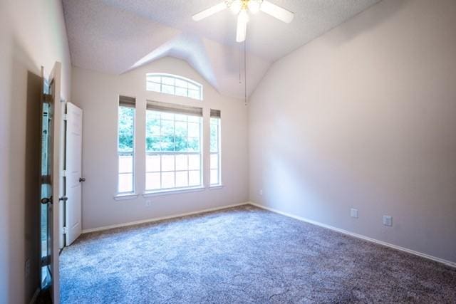 833 Tablerock Way, Lewisville, TX 75077 - carpeted empty room with lofted ceiling, a ceiling fan, and baseboards