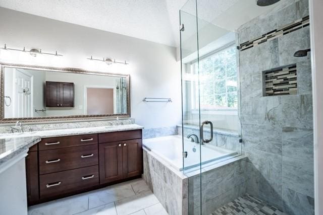 833 Tablerock Way, Lewisville, TX 75077 - full bath featuring double vanity, a garden tub, and a stall shower