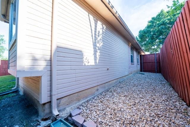 833 Tablerock Way, Lewisville, TX 75077 - view of side of home featuring a fenced backyard