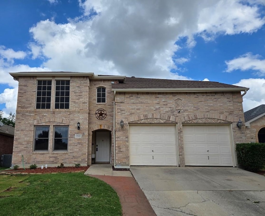 13412 Dove Ranch Rd, Fort Worth, TX 76262 - french country home with driveway, an attached garage, brick siding, and a front lawn