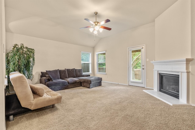408 Castle St, Desoto, TX 75115 - living room featuring carpet, ceiling fan, vaulted ceiling, a glass covered fireplace, and baseboards