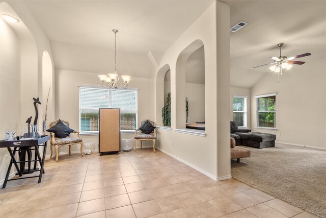408 Castle St, Desoto, TX 75115 - foyer entrance with lofted ceiling, light tile patterned flooring, ceiling fan, baseboards, and light carpet