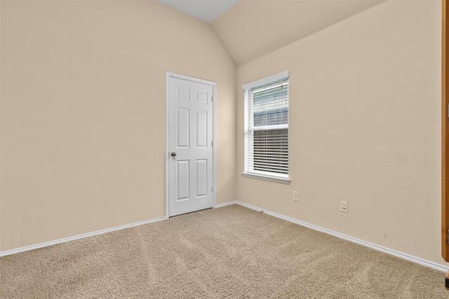 408 Castle St, Desoto, TX 75115 - unfurnished room with light colored carpet, lofted ceiling, and baseboards