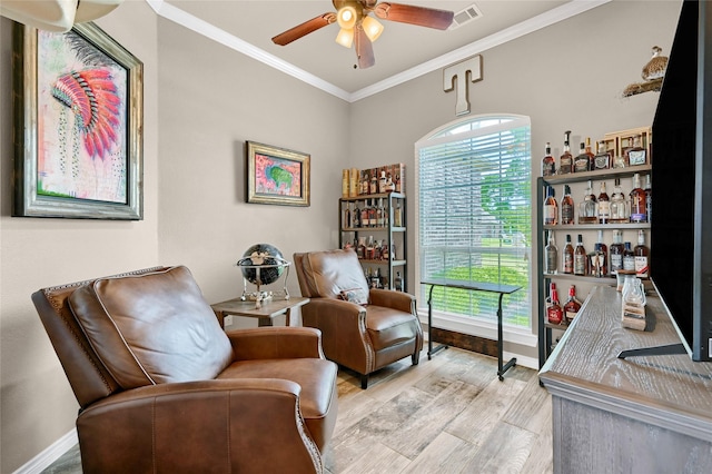 489 Roberts Run, Sherman, TX 75092 - sitting room featuring a ceiling fan, crown molding, plenty of natural light, light wood-style flooring, and baseboards