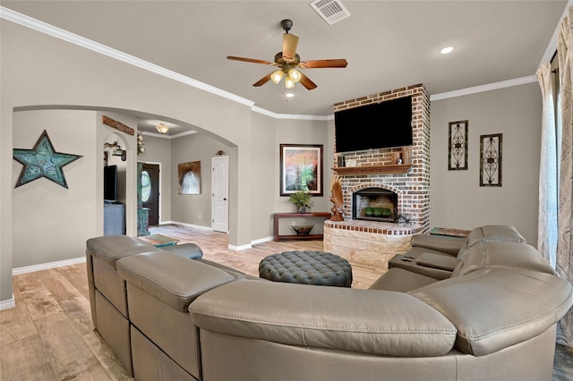 489 Roberts Run, Sherman, TX 75092 - living area featuring arched walkways, ceiling fan, baseboards, ornamental molding, and recessed lighting