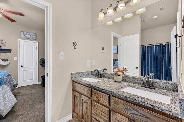 489 Roberts Run, Sherman, TX 75092 - ensuite bathroom featuring ceiling fan and double vanity