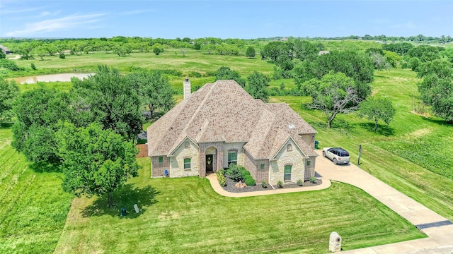 489 Roberts Run, Sherman, TX 75092 - view of subject property featuring a tree filled landscape