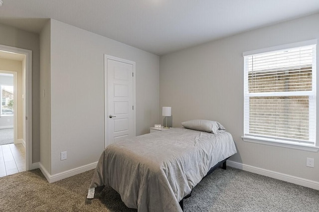 704 Griffith Park Trl, Alvarado, TX 76009 - carpeted bedroom featuring baseboards