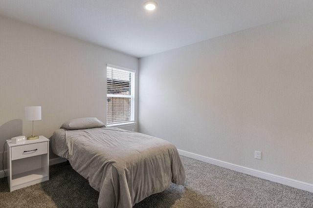 704 Griffith Park Trl, Alvarado, TX 76009 - bedroom featuring dark carpet and baseboards