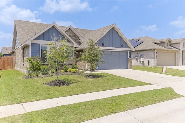 704 Griffith Park Trl, Alvarado, TX 76009 - view of front of home featuring board and batten siding, concrete driveway, brick siding, and a garage