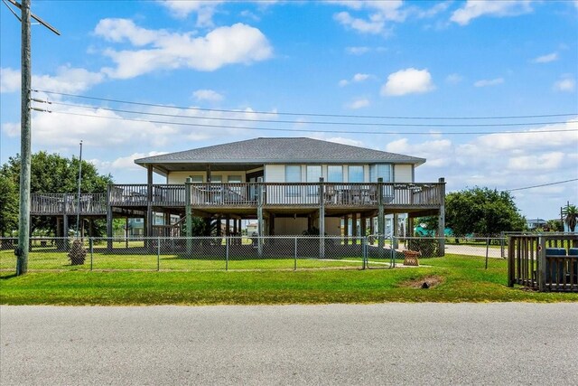 970 Gulfview Dr, Crystal Beach, TX 77650 - rear view of property with a wooden deck