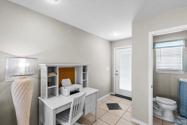 970 Gulfview Dr, Crystal Beach, TX 77650 - office area featuring light tile patterned floors and baseboards