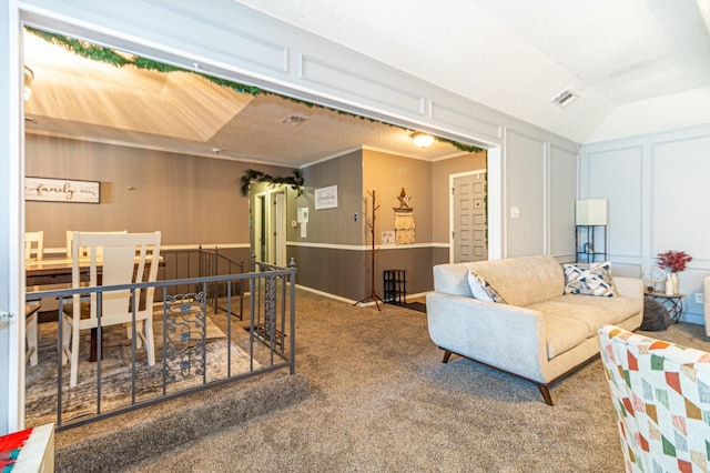 1501 Raintree Ct, Grand Prairie, TX 75050 - carpeted living area featuring a decorative wall and wainscoting