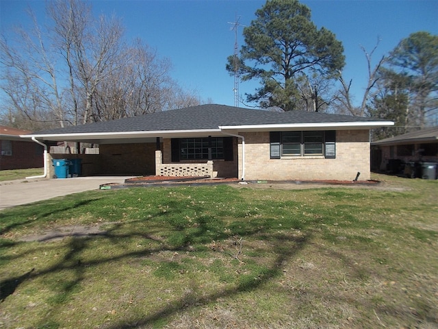 601 N 38th St, Corsicana, TX 75110 - ranch-style home featuring brick siding, a front yard, a carport, concrete driveway, and roof with shingles