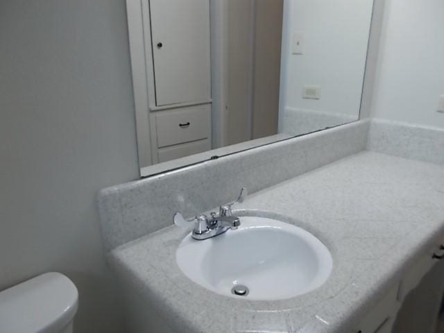 601 N 38th St, Corsicana, TX 75110 - half bathroom with toilet and vanity