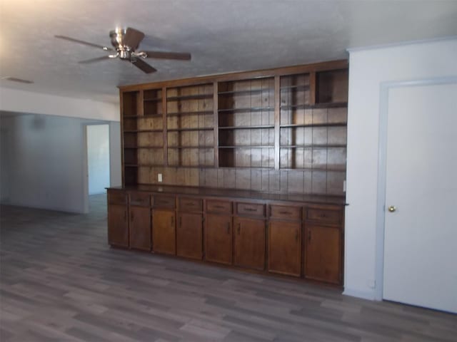 601 N 38th St, Corsicana, TX 75110 - spare room featuring wood finished floors and ceiling fan