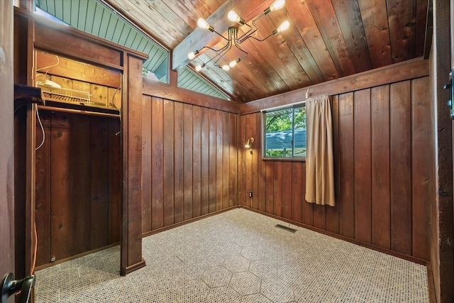 9598 Brockrim Ln, Quinlan, TX 75474 - carpeted empty room with wooden walls, lofted ceiling, wooden ceiling, and baseboards