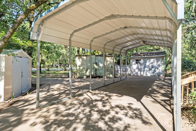 9598 Brockrim Ln, Quinlan, TX 75474 - view of parking / parking lot with a storage unit, a detached carport, and asphalt driveway