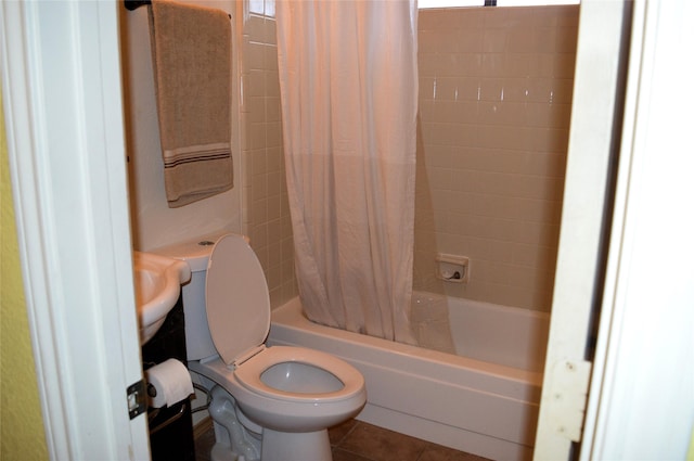 8109 Camelot Rd, Fort Worth, TX 76134 - bathroom with toilet, shower / bathtub combination with curtain, and tile patterned flooring