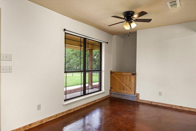 1511 Cabaniss Ln, Weatherford, TX 76088 - empty room with concrete floors, baseboards, and a ceiling fan