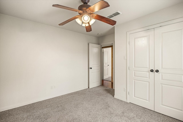 1511 Cabaniss Ln, Weatherford, TX 76088 - unfurnished bedroom featuring light colored carpet, a closet, baseboards, and a ceiling fan