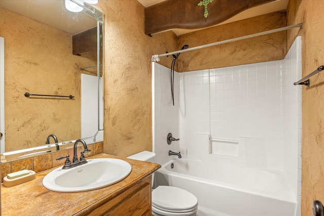 1511 Cabaniss Ln, Weatherford, TX 76088 - full bath with a textured wall, toilet, vanity, and washtub / shower combination