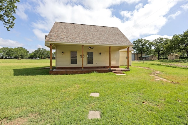 1511 Cabaniss Ln, Weatherford, TX 76088 - view of front of house featuring a front yard, a shingled roof, and ceiling fan