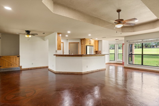 1511 Cabaniss Ln, Weatherford, TX 76088 - unfurnished living room with ceiling fan, concrete flooring, recessed lighting, and baseboards