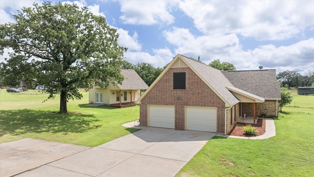 1511 Cabaniss Ln, Weatherford, TX 76088 - view of front of property featuring brick siding, a front lawn, and a garage