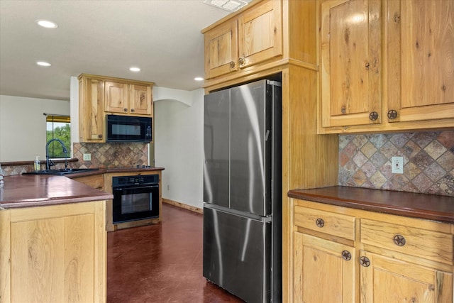 1511 Cabaniss Ln, Weatherford, TX 76088 - kitchen with black appliances, a sink, dark countertops, recessed lighting, and backsplash