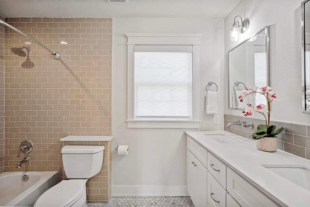 435 Allison Dr, Dallas, TX 75208 - bathroom with double vanity, toilet, shower / tub combination, tile patterned flooring, and baseboards