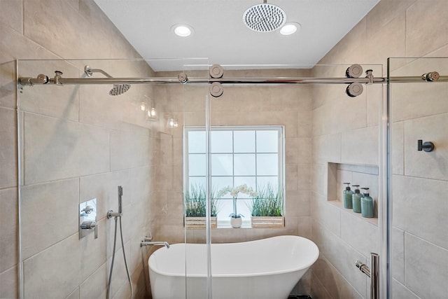 435 Allison Dr, Dallas, TX 75208 - full bath with a tile shower, tile walls, a freestanding tub, and recessed lighting