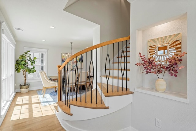 435 Allison Dr, Dallas, TX 75208 - staircase with a chandelier, wood finished floors, baseboards, and recessed lighting