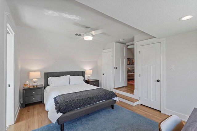 435 Allison Dr, Dallas, TX 75208 - bedroom with light wood finished floors, ceiling fan, baseboards, and recessed lighting