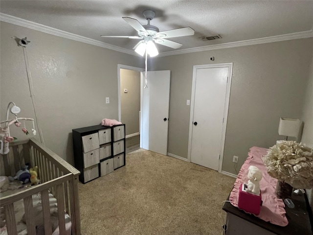 322 Cherry St, Weatherford, TX 76086 - carpeted bedroom with crown molding and ceiling fan