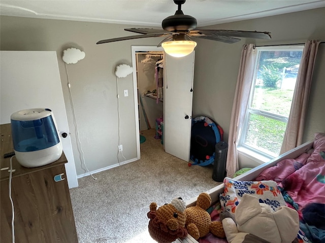 322 Cherry St, Weatherford, TX 76086 - carpeted bedroom with a walk in closet, a ceiling fan, baseboards, and a closet