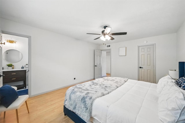 7201 Harwick Ln, North Richland Hills, TX 76182 - bedroom with light wood finished floors, baseboards, and ceiling fan